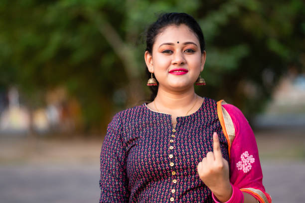 istock Young shows her after casting vote in Election. 1478155959