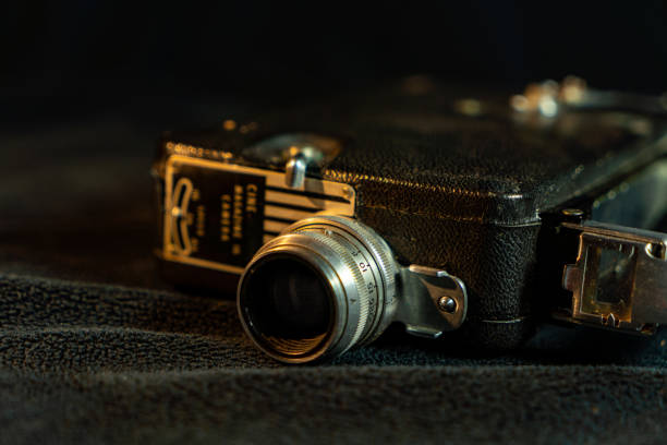 istock Vintage film camera with black background 1478157135