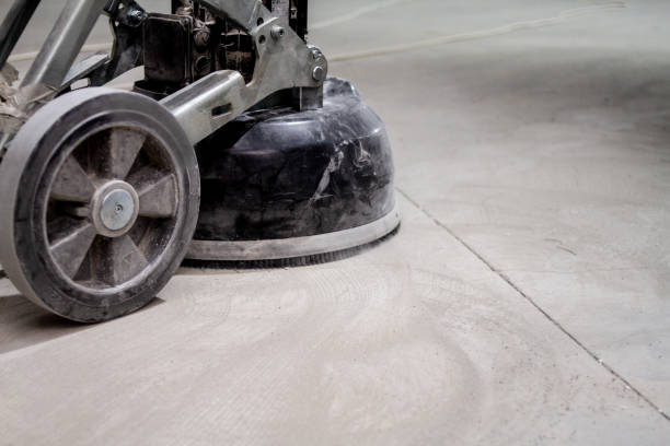 istock concrete floor grinding machine is an essential tool used to prepare the surface of a concrete floor before the installation of a new layer. 1478161406