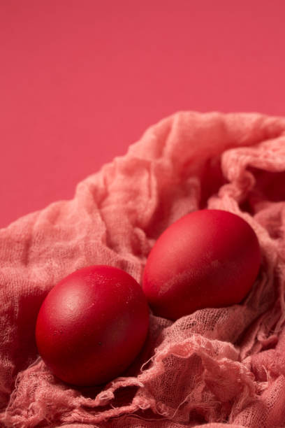istock Pink chicken eggs on gauze on a pink 1478167414