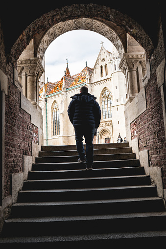 A man arriving at the Fishermen's Bastion at the heart of Buda's Castle District in Budapest, Hungary
