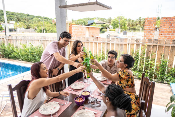 istock Friends toasting a beer on a barbecue at home 1478170602