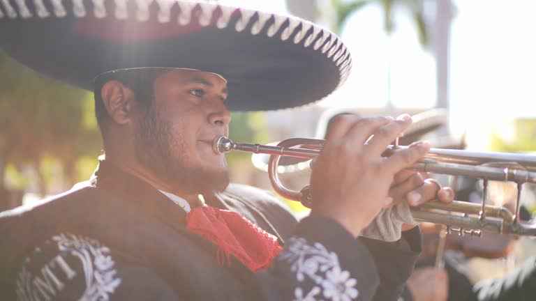 Traditional mariachi trumpeter playing outdoors