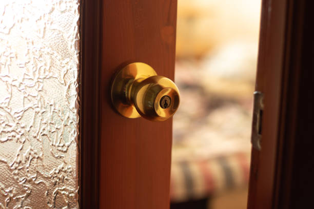 open door to the room and handle close-up stock photo