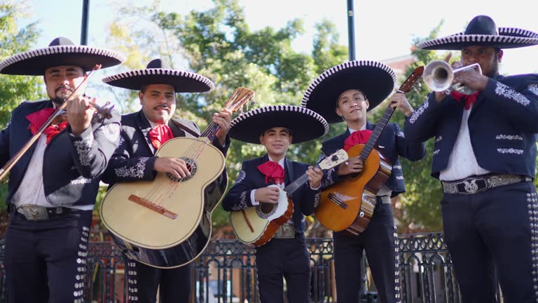 Group of traditional mariachis playing outdoors