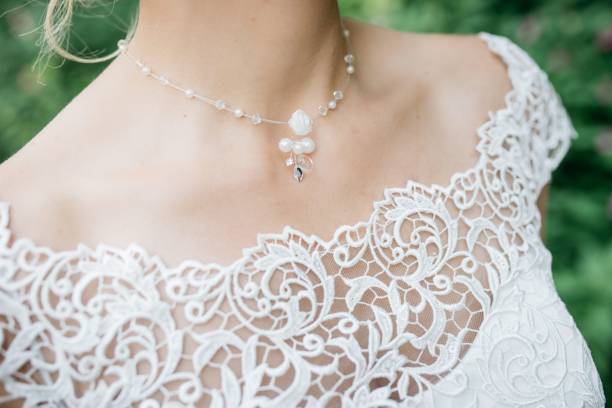istock Bride wearing a necklace featuring a floral pendant 1478178825