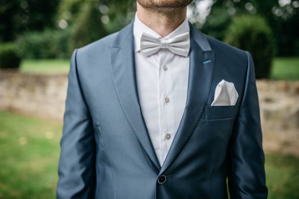 istock Smartly dressed person at wedding wearing a suit and a coordinating bow tie 1478178953