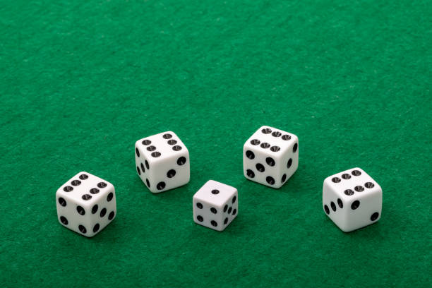 casino chips and dice on the blue background
