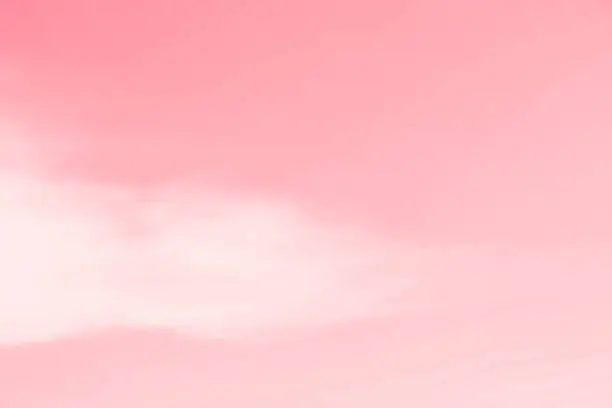 Photo of Pink sky with white cirrus cloud, soft sky background