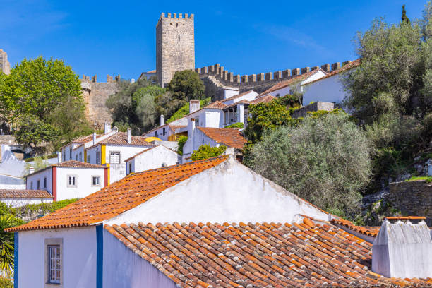 istock Castle wall behind homes in Obidos. 1478188866