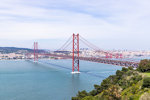 Europe, Portugal, Lisbon. The 25th of April Bridge across the Tagus River in Lisbon.