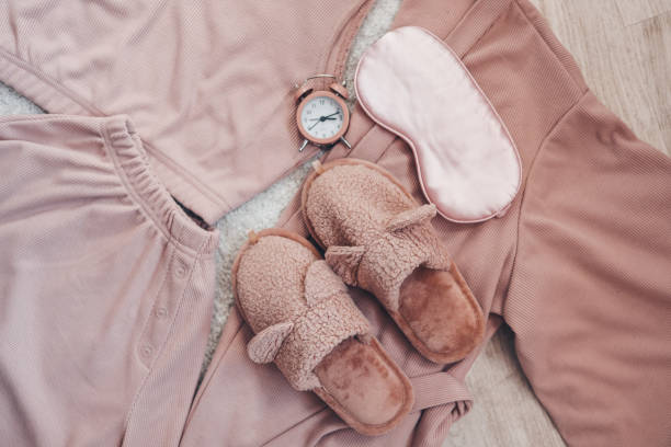 istock Flat lay composition with house slippers, sleeping mask and pajamas on light background 1478195725