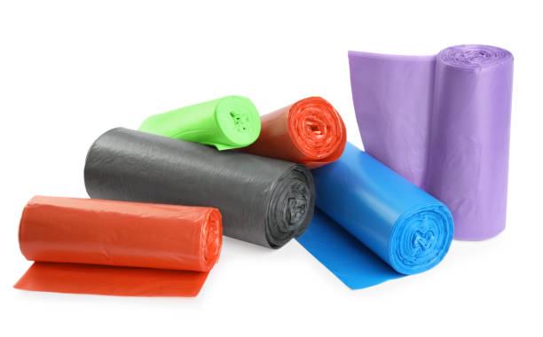 istock Rolls of different color garbage bags isolated on white 1478197342