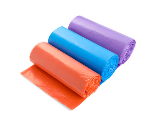 istock Rolls of different color garbage bags isolated on white 1478197431