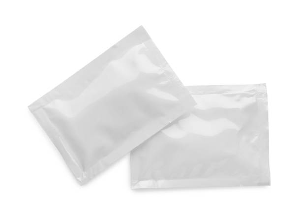 istock Blank sachets with wet wipes on white background, top view. Space for design 1478198292
