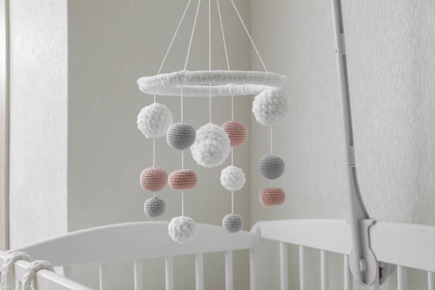 istock Modern baby mobile under crib in children's room 1478198744