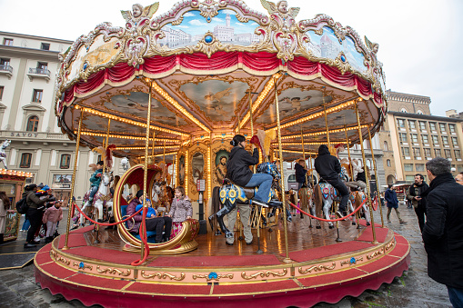 Florence, Italy - feb 25, 2023 - Old carousel with horses in Piazza della Repubblica in Florence, Tuscany, Italy