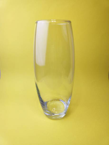 istock Glass Vase, yellow background, water, blue hydrogel 1478213814