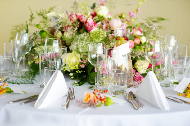 istock Beautiful table setting with crockery and flowers for a party, wedding reception or other festive event 1478224115