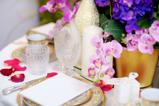 istock Beautiful table setting with crockery and flowers for a party, wedding reception or other festive event 1478224183