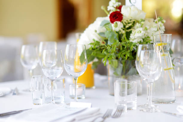 istock Beautiful table setting with crockery and flowers for a party, wedding reception or other festive event 1478225306