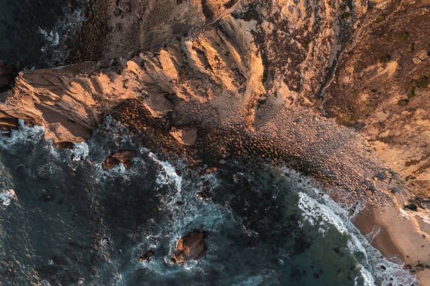istock Sea waving near rocky shore 1478227688