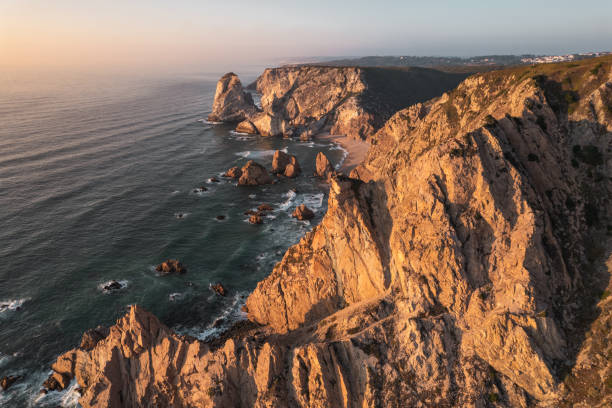 istock Rock formations near sea at sunset 1478227845