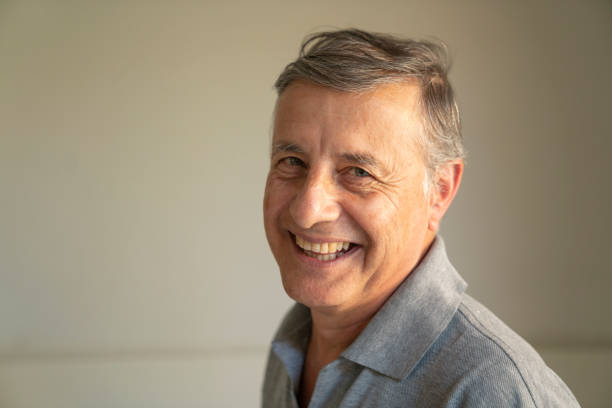 istock Portrait of senior man smiling with confidence 1478228132
