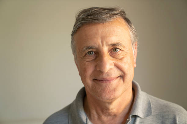 istock Portrait of senior man smiling with confidence 1478228140