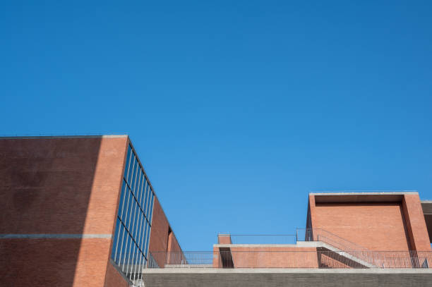 istock Part of a red brick building on a sunny day 1478236232