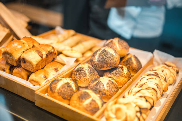 istock Different Types Of Bread And Pastries On A Display In An Artisan Bakery 1478239791