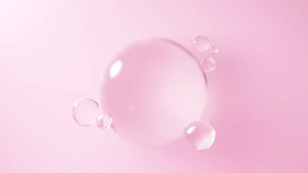 istock 3D Illustration.Multiple spheres of water on pink background. Glass sphere. (Horizontal) 1478247654