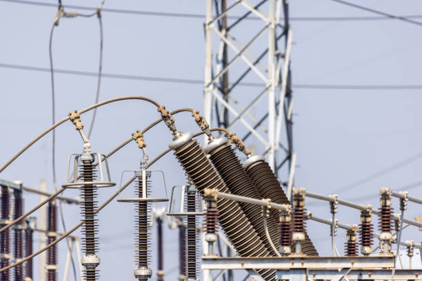 istock High voltage ceramic insulators on a transformer in Power Substation. 1478255451