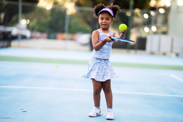 istock Five years old girl playing a pickle ball game 1478256315