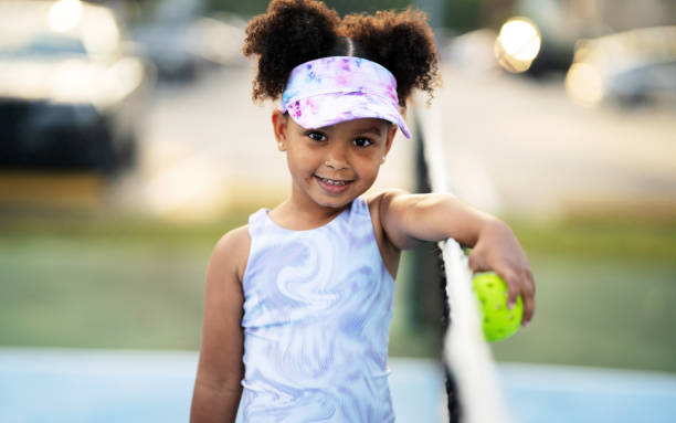 istock Five years old girl posing with a pickle ball 1478256977