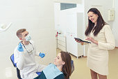 the dentist's appointment, doctors consider the cost of treatment and coordinate with the patient