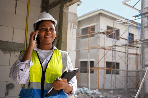 Woman worker engineer as project manager . Woman worker engineer as project manager in construction site. Leadership of African American female. african american architecture stock pictures, royalty-free photos & images