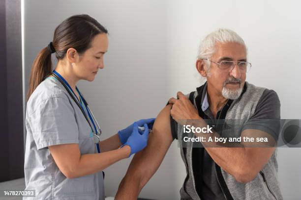 Yearly Cold And Flu Vaccination Stock Photo - Download Image Now - Vaccination, Flu Vaccine, Senior Adult