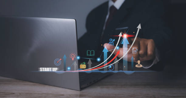 istock Businessman accessing startup business by computer with icon startup network. 1478271496