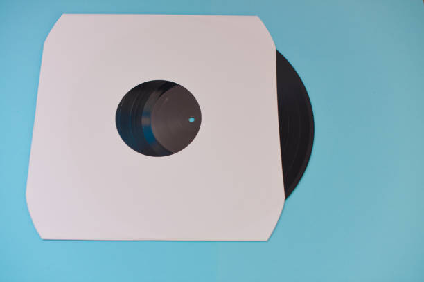 istock Vinyl record in sleeve isolated against blue background 1478272364