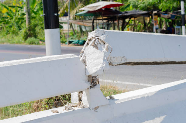 border of the concrete bridge is broken and dangerous to users.