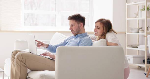 istock Family Couple Using Laptop 1478273573
