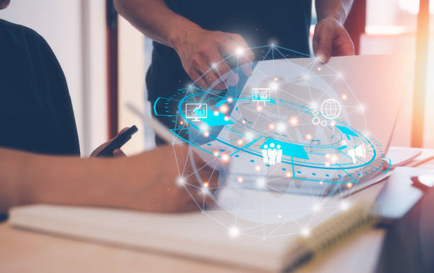 istock Digital transformation technology strategy, IoT, internet of things. transformation of ideas and the adoption of technology in business , enhancing global business capabilities. Ai, staff meeting  on table using smart phone and computer laptop in office 1478279523