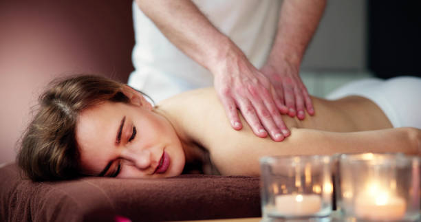 istock Beautiful Young Woman Getting Back Massage 1478289161