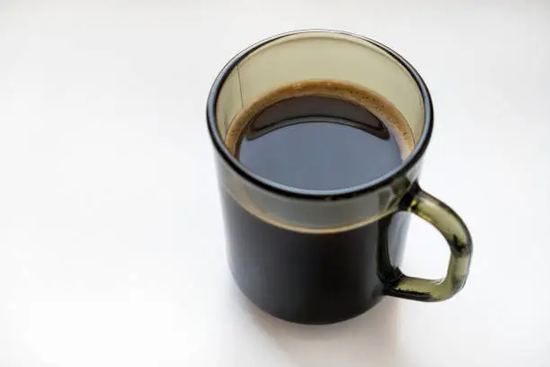 Coffee Mug on the White Table closeup