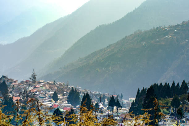 A majestic view of Shillong surrounded by Sylvan hills and blue sky.