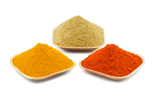 Indian Colorful Spices Also Know as Red Chilli Powder, Turmeric Powder, Coriander Powder, Mirchi, Mirch, Haldi, Dhaniya Powder Isolated on White Background