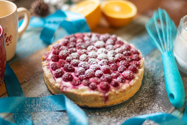 homemade cheesecake with raspberries and oranges