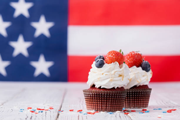 istock Sweet cupcakes with blueberries and strawberry , flag background 1478305609