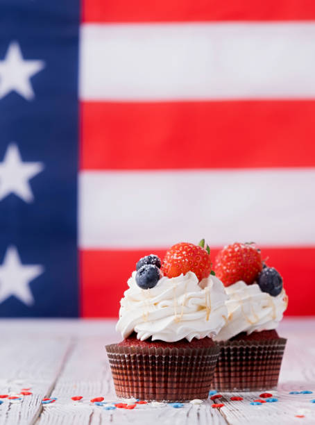 istock Sweet cupcakes with blueberries and strawberry , flag background 1478305645